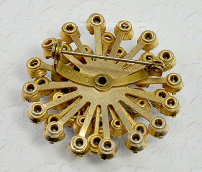 Triad brooch store